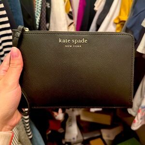 Kate Spade black wristlet. Super versatile and holds just the essentials.